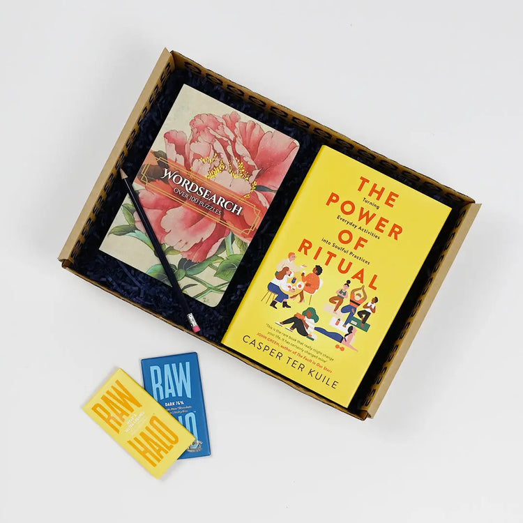 Positive Mental Health Gift  containing a book titled 'The Power of Ritual', a word search book, and a box of raw chocolate.